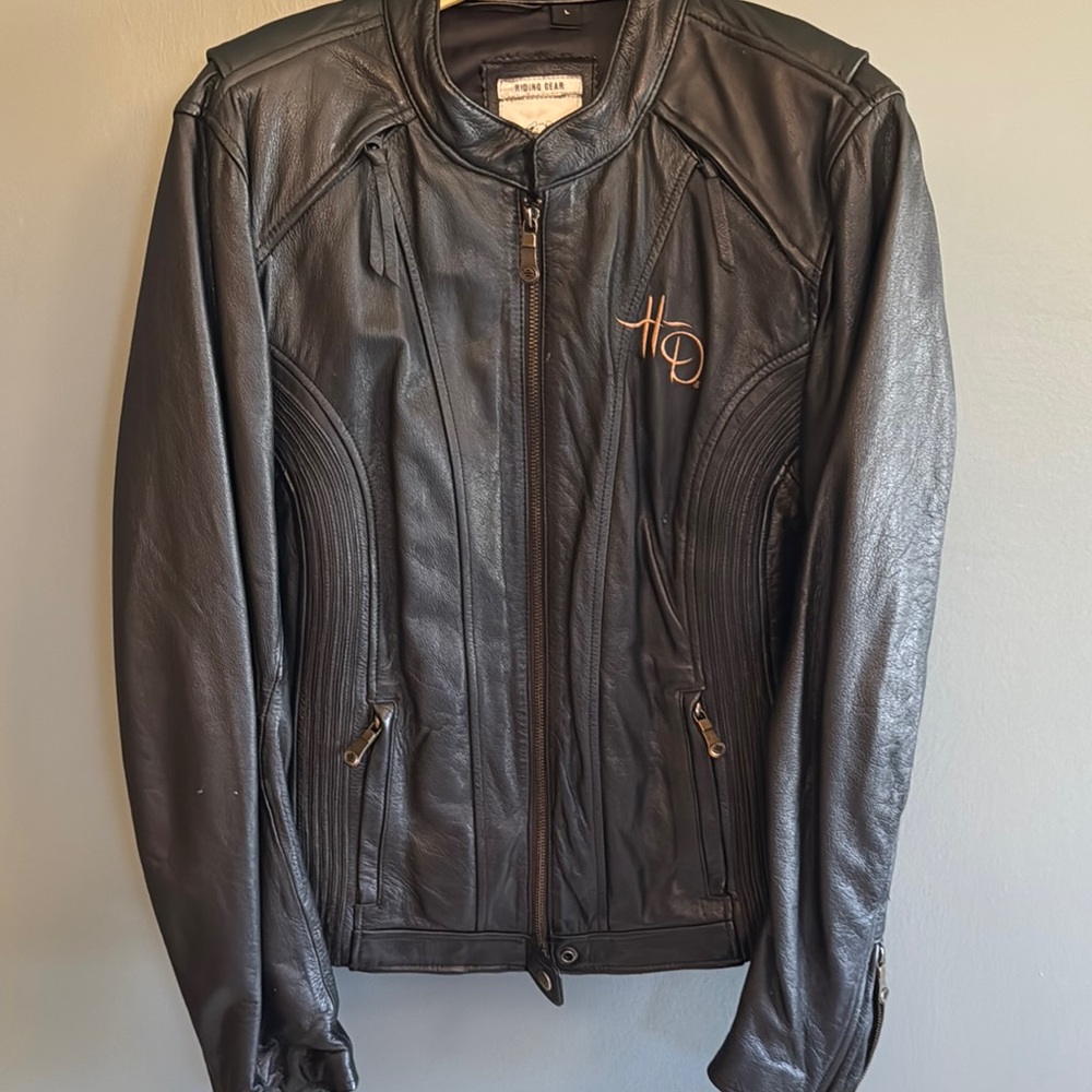 Harley-Davidson Ladies 110th Ann. Leather jacket with insert hooded sweatshirt.